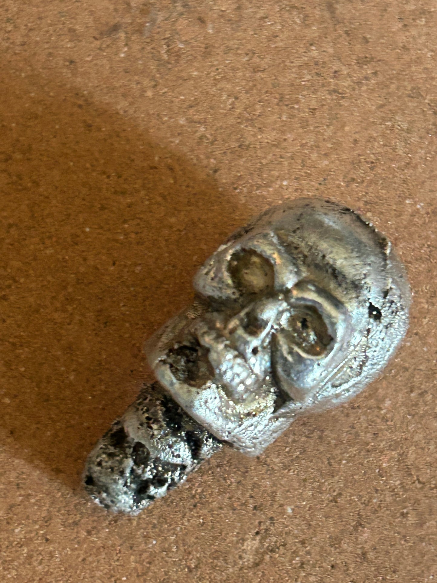 Hand poured pure silver skull