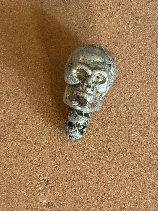 Hand poured pure silver skull