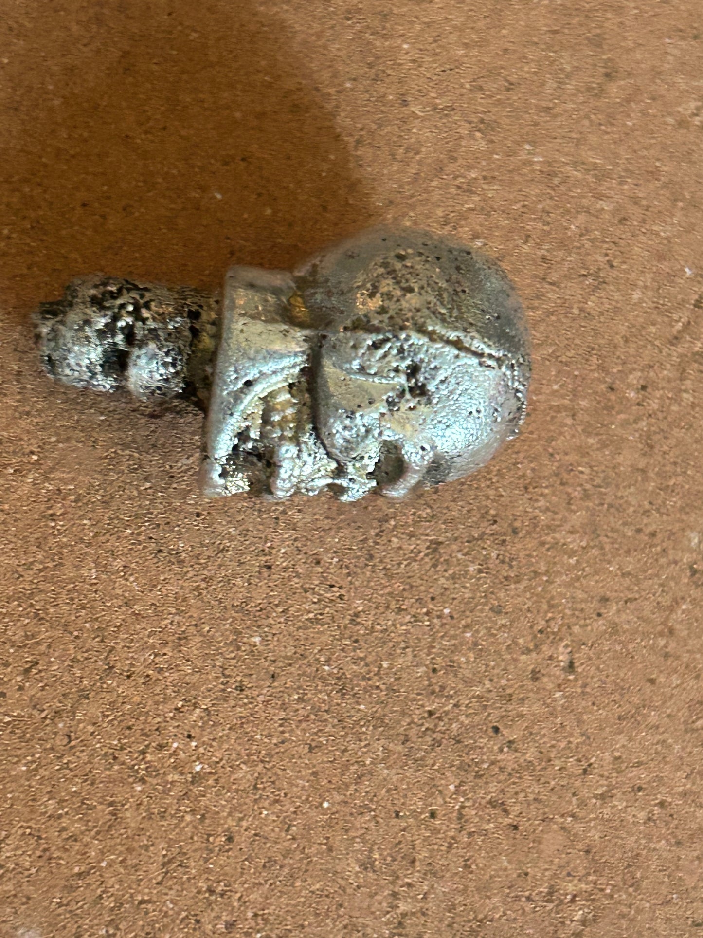 Hand poured pure silver skull