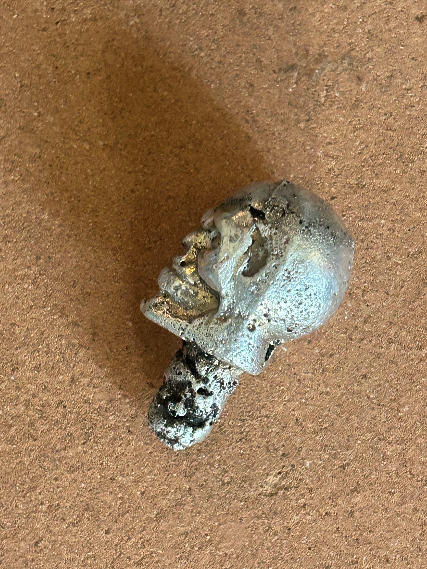 Hand poured pure silver skull
